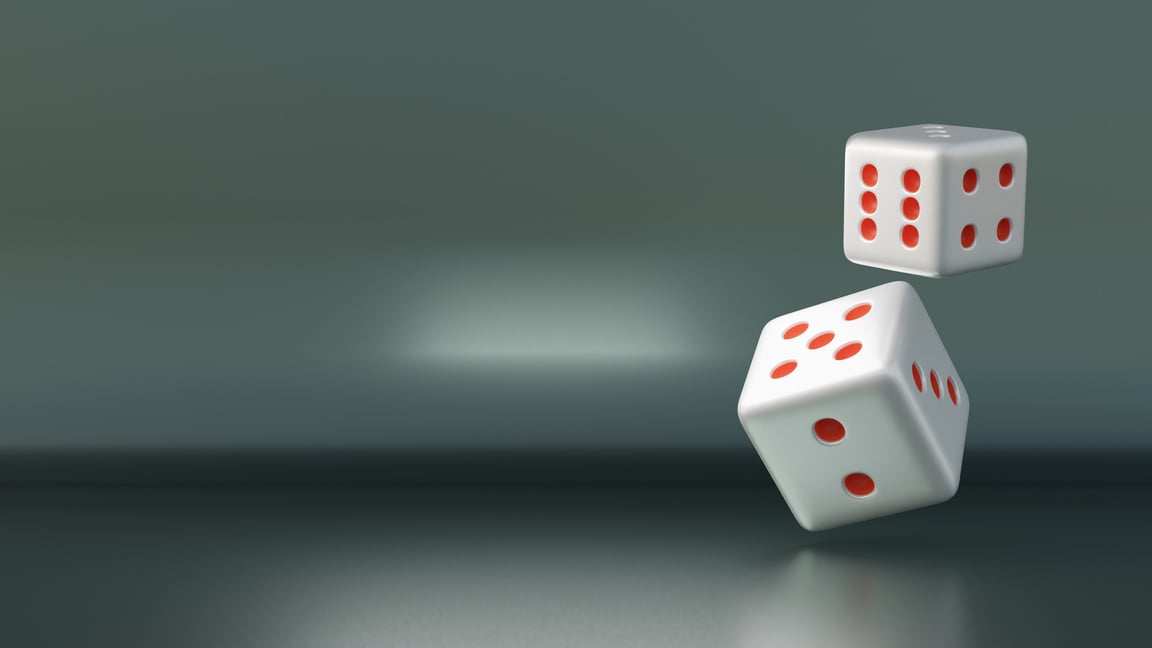 3D rendering. Dice on dark background with Business risk concept.